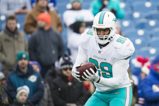 ORCHARD PARK, NY - DECEMBER 17:  Julius Thomas #89 of the Miami Dolphins participates in warm ups before the game against the Buffalo Bills at New Era Field on December 17, 2017 in Orchard Park, New York. Buffalo defeats Miami 24-16.  (Photo by Brett Carlsen/Getty Images)