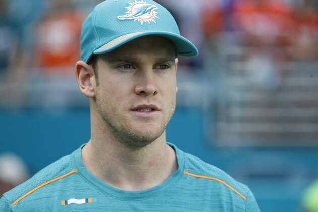 Miami Dolphins injured quarterback Ryan Tannehill on the sidelines before an NFL football game against the Denver Broncos, Sunday, Dec. 3, 2017, in Miami Gardens, Fla. (AP Photo/Wilfredo Lee)