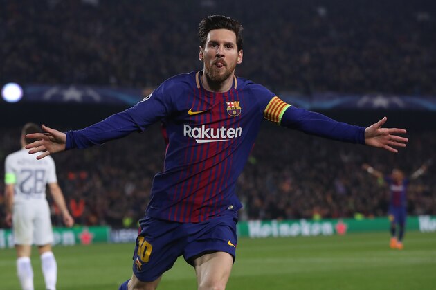 BARCELONA, SPAIN - MARCH 14: Lionel Messi of FC Barcelona celebrates after he scores his team's third goal during the UEFA Champions League Round of 16 Second Leg match FC Barcelona and Chelsea FC at Camp Nou on March 14, 2018 in Barcelona, Spain. (Photo by Ian MacNicol/Getty Images)