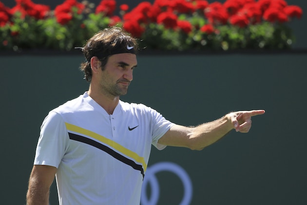 Roger Federer gestures during the third round of the BNP Paribas Open tennis tournament against Filip Krajinovic at the Indian Wells Tennis Garden in Indian Wells, Calif., Monday, March 12, 2018. (AP Photo/Crystal Chatham)