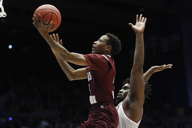 Texas Southern's Demontrae Jefferson shoots in front of North Carolina Central's Larry McKnight Jr., right, during the first half of a First Four game of the NCAA men's college basketball tournament Wednesday, March 14, 2018, in Dayton, Ohio. (AP Photo/John Minchillo) Texas Southern's Demontrae Jefferson shoots in front of North Carolina Central's Larry McKnight Jr., right, during the first half of a First Four game of the NCAA men's college basketball tournament Wednesday, March 14, 2018, in Dayton, Ohio. (AP Photo/John Minchillo)