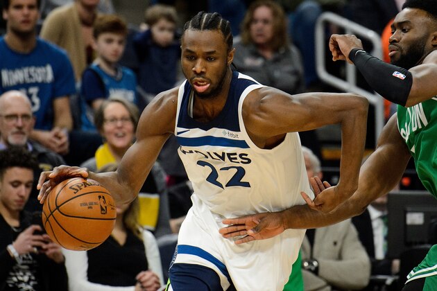 MINNEAPOLIS, MN - MARCH 08: Andrew Wiggins #22 of the Minnesota Timberwolves drives to the basket against Jaylen Brown #7 of the Boston Celtics during the game on March 8, 2018 at the Target Center in Minneapolis, Minnesota. NOTE TO USER: User expressly acknowledges and agrees that, by downloading and or using this Photograph, user is consenting to the terms and conditions of the Getty Images License Agreement. (Photo by Hannah Foslien/Getty Images)