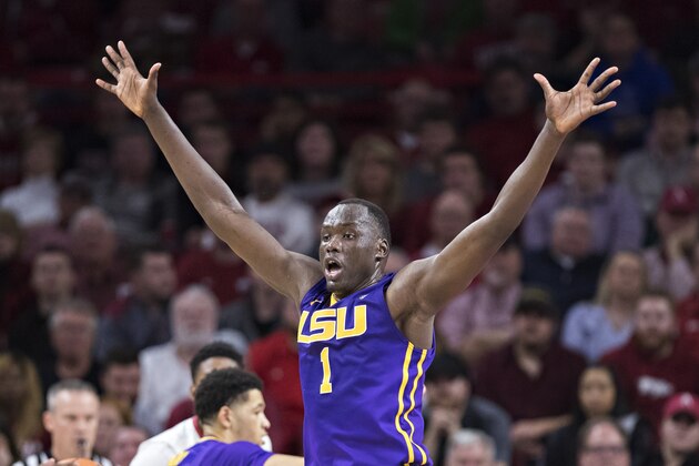 FAYETTEVILLE, AR - JANUARY 10:  Duop Reath #1 of the LSU Tigers dribbles spreads his arms on defense during a game against the Arkansas Razorbacks at Bud Walton Arena on January 10, 2018 in Fayetteville, Arkansas.  The Tigers defeated the Razorbacks 75-54.  (Photo by Wesley Hitt/Getty Images)