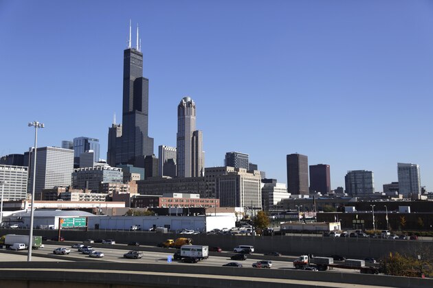 FILE - A Nov. 7, 2013 file photo shows a view of Chicago's 110 story, 1,450 foot Willis Tower. Blackstone announced Monday, March 16, 2015 that it is buying Chicago’s Willis Tower, once called the Sears Tower, from 233 South Wacker LLC for an undisclosed amount. The Willis Tower is 110-stories and the second-tallest office building in the U.S. It is the fifth-tallest office building in the world. (AP Photo/M. Spencer Green, File)