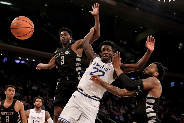 NEW YORK, NY - MARCH 08:  Myles Cale #22 of the Seton Hall Pirates fights for the ball with Kamar Baldwin #3 and Tyler Wideman #4 of the Butler Bulldogs during quarterfinals of the Big East Basketball Tournament at Madison Square Garden on March 8, 2018 in New York City.The Butler Bulldogs defeated the Seton Hall Pirates 75-74.  (Photo by Elsa/Getty Images)