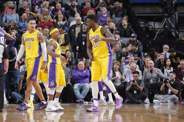 SACRAMENTO, CA - FEBRUARY 24: Isaiah Thomas #7 and Julius Randle #30 of the Los Angeles Lakers celebrate during the game against the Sacramento Kings on February 24, 2018 at Golden 1 Center in Sacramento, California. NOTE TO USER: User expressly acknowledges and agrees that, by downloading and or using this photograph, User is consenting to the terms and conditions of the Getty Images Agreement. Mandatory Copyright Notice: Copyright 2018 NBAE (Photo by Rocky Widner/NBAE via Getty Images)