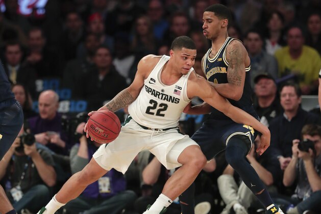 Michigan State guard Miles Bridges (22) drives against Michigan guard Charles Matthews (1) during the second half of an NCAA Big Ten Conference tournament semifinal college basketball game, Saturday, March 3, 2018, in New York. Michigan won 75-64. (AP Photo/Julie Jacobson) Michigan State guard Miles Bridges (22) drives against Michigan guard Charles Matthews (1) during the second half of an NCAA Big Ten Conference tournament semifinal college basketball game, Saturday, March 3, 2018, in New York. Michigan won 75-64. (AP Photo/Julie Jacobson)