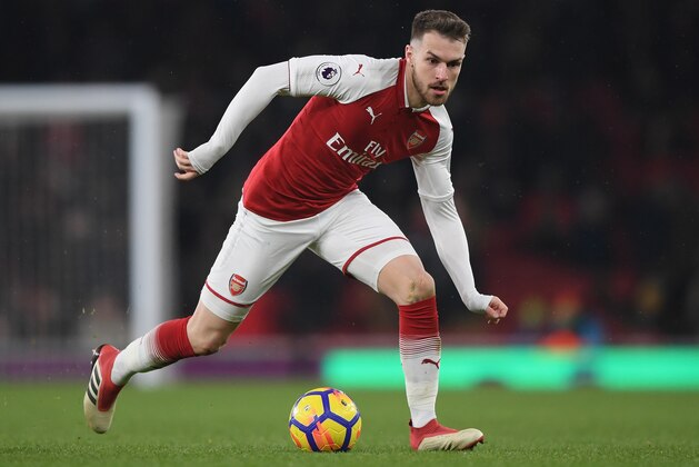 LONDON, ENGLAND - MARCH 01:  Aaron Ramsey of Arsenal runs with the ball during the Premier League match between Arsenal and Manchester City at Emirates Stadium on March 1, 2018 in London, England.  (Photo by Shaun Botterill/Getty Images)