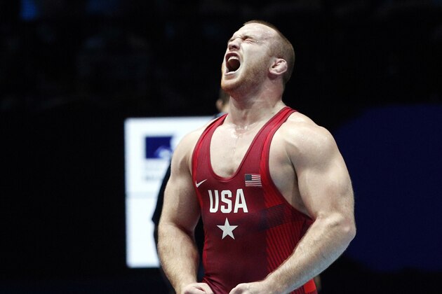 United States' Kyle Frederick Snyder celebrates after defeating Abdulrashid Sadulaev of Russia in the men's free style 97 kg category during the final of the Wrestling World Cup at the Paris Bercy Arena, in Paris, France, Saturday, Aug. 26, 2017. (AP Photo/Christophe Ena)