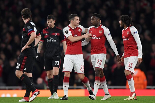 LONDON, ENGLAND - MARCH 15:  Granit Xhaka of Arsenal celebrates scoring the second goal with Danny Welbeck during the UEFA Europa League Round of 16 Second Leg match between Arsenal and AC Milan at Emirates Stadium on March 15, 2018 in London, England.  (Photo by Shaun Botterill/Getty Images)