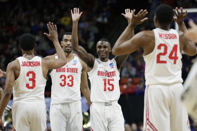 Ohio State guard Kam Williams (15) celebrates with teammates after a play during the first half of a first-round game against South Dakota State in the NCAA college basketball tournament, Thursday, March 15, 2018, in Boise, Idaho. (AP Photo/Ted S. Warren)