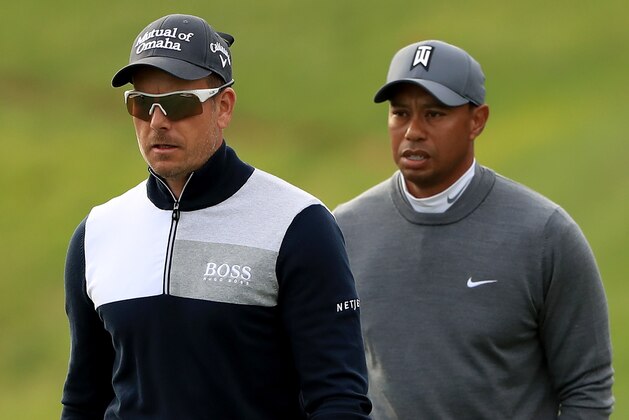 PALM HARBOR, FL - MARCH 08:  Henrik Stenson of Sweden and Tiger Woods walk down the 15th hole during the first round of the Valspar Championship at Innisbrook Resort Copperhead course on March 8, 2018 in Palm Harbor, Florida.  (Photo by Sam Greenwood/Getty Images)