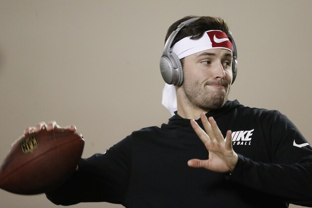 Oklahoma quarterback Baker Mayfield warms up during an NCAA college football Pro Day workout in Norman, Okla., Wednesday, March 14, 2018. (AP Photo/Sue Ogrocki)