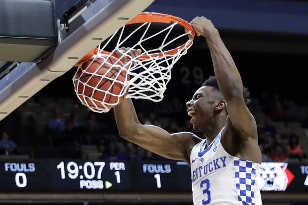 Kentucky guard Hamidou Diallo starts off the team's first-round game against Davidson with a dunk during the NCAA men's college basketball tournament Thursday, March 15, 2018, in Boise, Idaho. (AP Photo/Otto Kitsinger)