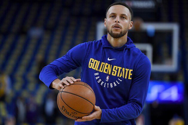 OAKLAND, CA - MARCH 14:  Stephen Curry #30 of the Golden State Warriors works out prior to the start of an NBA Basketball game against the Los Angeles Lakers at ORACLE Arena on March 14, 2018 in Oakland, California. NOTE TO USER: User expressly acknowledges and agrees that, by downloading and or using this photograph, User is consenting to the terms and conditions of the Getty Images License Agreement.  (Photo by Thearon W. Henderson/Getty Images)