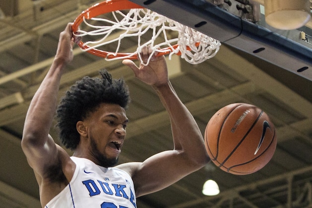 FILE - In this Jan. 27, 2018, file photo, Duke's Marvin Bagley III (35) dunks the ball during the first half of an NCAA college basketball game against Virginia in Durham, N.C. Bagley was named the ACC player of the year, Tuesday, March 6, 2018. (AP Photo/Ben McKeown, File)