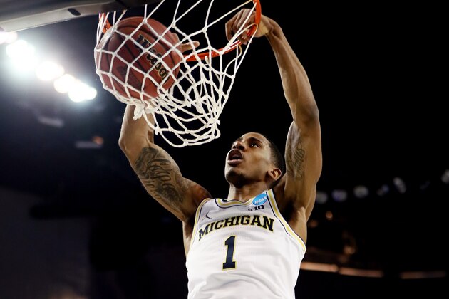 WICHITA, KS - MARCH 15:  Charles Matthews #1 of the Michigan Wolverines dunks the ball against the Montana Grizzlies during the first half of the first round of the 2018 NCAA Men's Basketball Tournament at INTRUST Arena on March 15, 2018 in Wichita, Kansas.  (Photo by Jamie Squire/Getty Images)