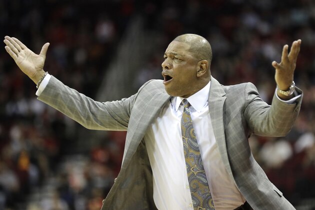 Los Angeles Clippers coach Doc Rivers argues a call by the officials during the first half of an NBA basketball game against the Houston Rockets Thursday, March 15, 2018, in Houston. (AP Photo/David J. Phillip)