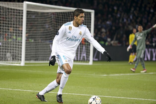 PARIS, FRANCE - MARCH 6: Raphael Varane of Real Madrid during the UEFA Champions League Round of 16 Second Leg match between Paris Saint-Germain (PSG) and Real Madrid at Parc des Princes stadium on March 6, 2018 in Paris, France. (Photo by Jean Catuffe/Getty Images)