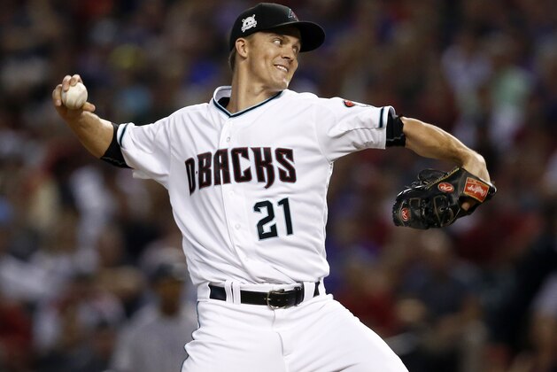 Arizona Diamondbacks starting pitcher Zack Greinke (21) throws against the Colorado Rockies during the second inning of the National League wild-card playoff baseball game, Wednesday, Oct. 4, 2017, in Phoenix. (AP Photo/Ross D. Franklin)