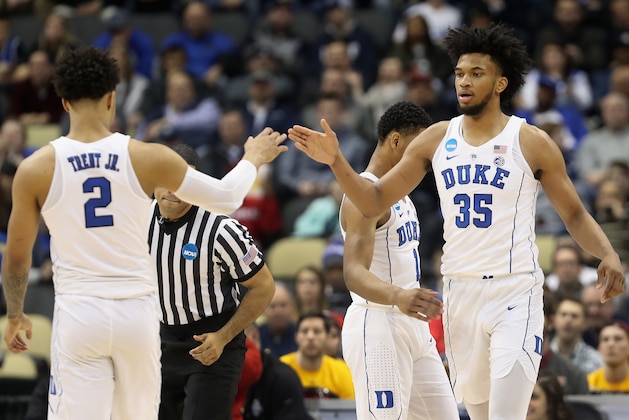 PITTSBURGH, PA - MARCH 15:  Marvin Bagley III #35 of the Duke Blue Devils celebrates with teammate Gary Trent Jr. #2 after hitting a three pointer against the Iona Gaels during the first half of the game in the first round of the 2018 NCAA Men's Basketball Tournament at PPG PAINTS Arena on March 15, 2018 in Pittsburgh, Pennsylvania.  (Photo by Rob Carr/Getty Images)