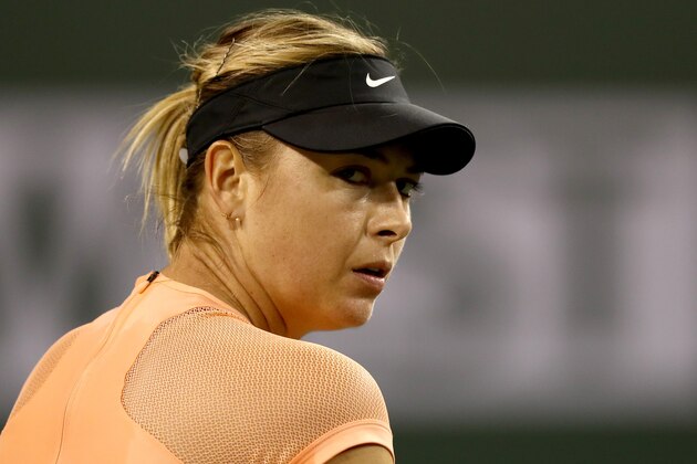 INDIAN WELLS, CA - MARCH 07:  Maria Sharapova of Russia cools down between games while playing Naomi Osaka of Japan during the BNP Paribas Open at the Indian Wells Tennis Garden on March 7, 2018 in Indian Wells, California.  (Photo by Matthew Stockman/Getty Images)