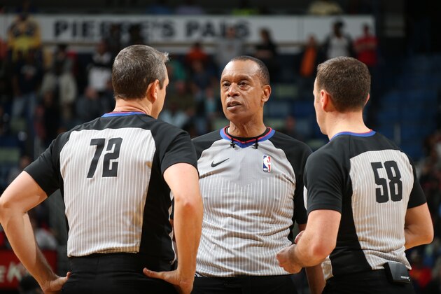 NEW ORLEANS, LA - MARCH 13: Referees Josh Tiven, Rodney Mott, and J.T. Orr huddle up during the Charlotte Hornets game against the New Orleans Pelicans on March 13, 2018 at Smoothie King Center in New Orleans, Louisiana. NOTE TO USER: User expressly acknowledges and agrees that, by downloading and or using this Photograph, user is consenting to the terms and conditions of the Getty Images License Agreement. Mandatory Copyright Notice: Copyright 2018 NBAE (Photo by Layne Murdoch/NBAE via Getty Images)