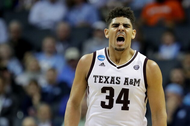 CHARLOTTE, NC - MARCH 16:  Tyler Davis #34 of the Texas A&M Aggies reacts in the second half against the Providence Friars during the first round of the 2018 NCAA Men's Basketball Tournament at Spectrum Center on March 16, 2018 in Charlotte, North Carolina.  (Photo by Streeter Lecka/Getty Images)