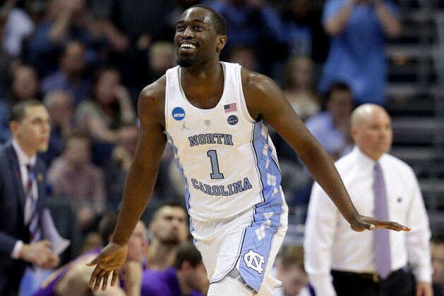 CHARLOTTE, NC - MARCH 16: Theo Pinson #1 of the North Carolina Tar Heels reacts after scoring against the Lipscomb Bisons during the first round of the 2018 NCAA Men's Basketball Tournament at Spectrum Center on March 16, 2018 in Charlotte, North Carolina.  (Photo by Streeter Lecka/Getty Images)
