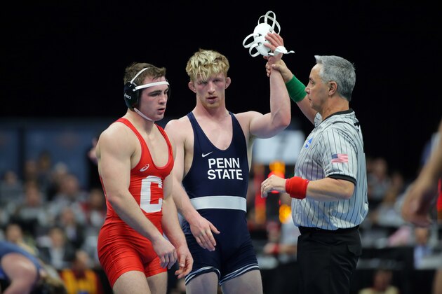 CLEVELAND, OH - MARCH 16: Bo Nickal of the Penn State Nittany Lions gets his hand raised after defeating Maxwell Dean of the Cornell Big Red during session three of the NCAA Wrestling Championships on March 16, 2018 at QuickenLoans Arena in Cleveland, Ohio. (Photo by Hunter Martin/Getty Images)
