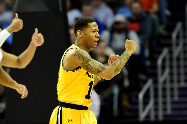 CHARLOTTE, NC - MARCH 16: Jairus Lyles #10 of the UMBC Retrievers looks for a foul call against the Virginia Cavaliers during the first round of the 2018 NCAA Men's Basketball Tournament at Spectrum Center on March 16, 2018 in Charlotte, North Carolina.  (Photo by Jared C. Tilton/Getty Images)