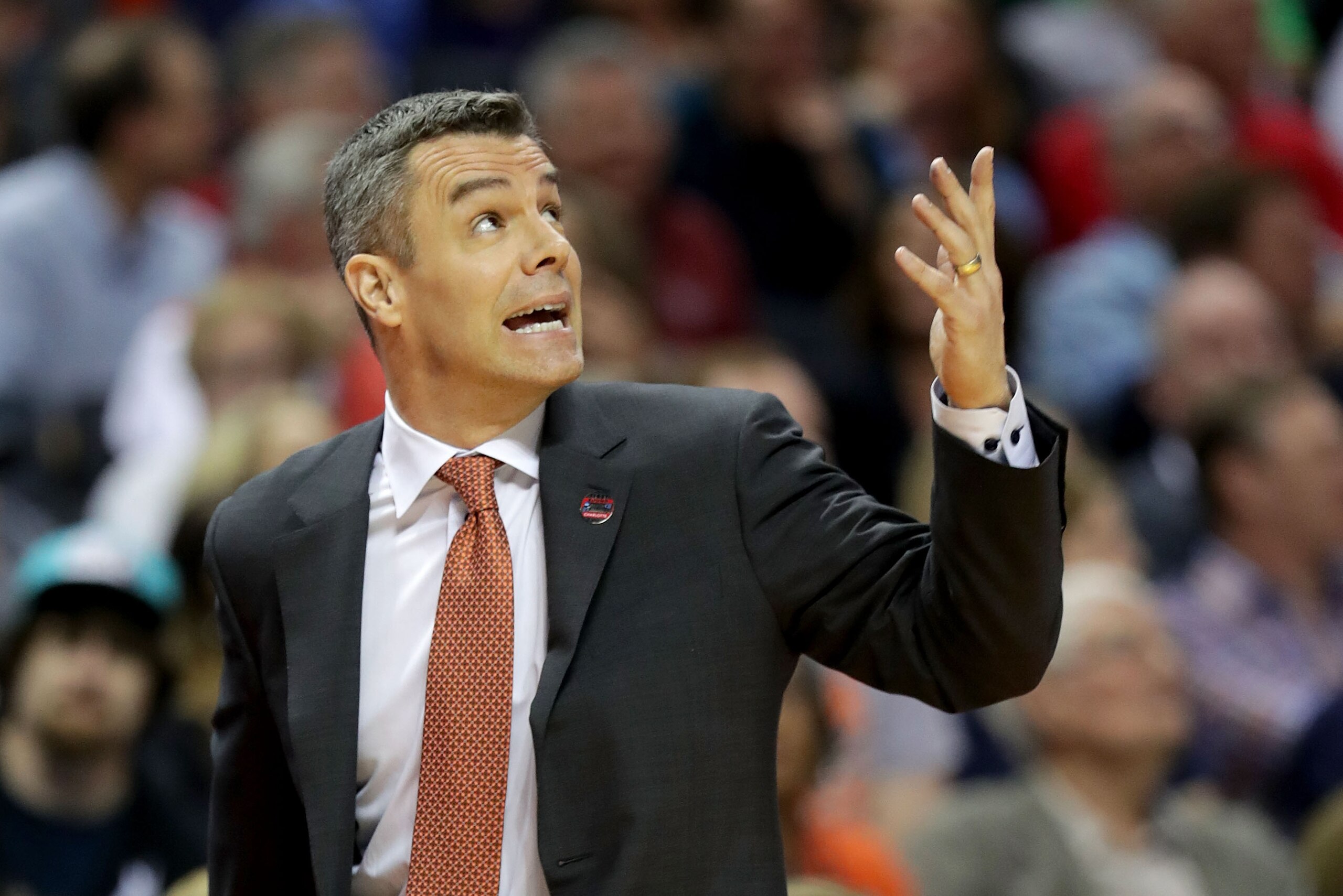 CHARLOTTE, NC - MARCH 16:  Head coach Tony Bennett of the Virginia Cavaliers looks to the scoreboard against the UMBC Retrievers during the first round of the 2018 NCAA Men's Basketball Tournament at Spectrum Center on March 16, 2018 in Charlotte, North Carolina.  (Photo by Streeter Lecka/Getty Images)