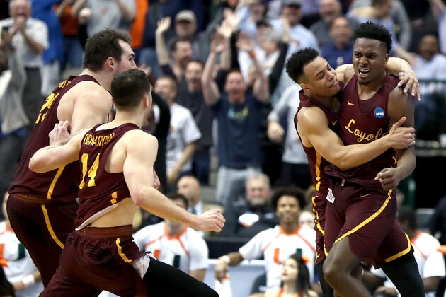 DALLAS, TX - MARCH 15:  Donte Ingram #0 and Marques Townes #5 of the Loyola Ramblers celebrate after Ingram makes a game-winning three pointer against the Miami Hurricanes in the first round of the 2018 NCAA Men's Basketball Tournament at American Airlines Center on March 15, 2018 in Dallas, Texas.  (Photo by Ronald Martinez/Getty Images)