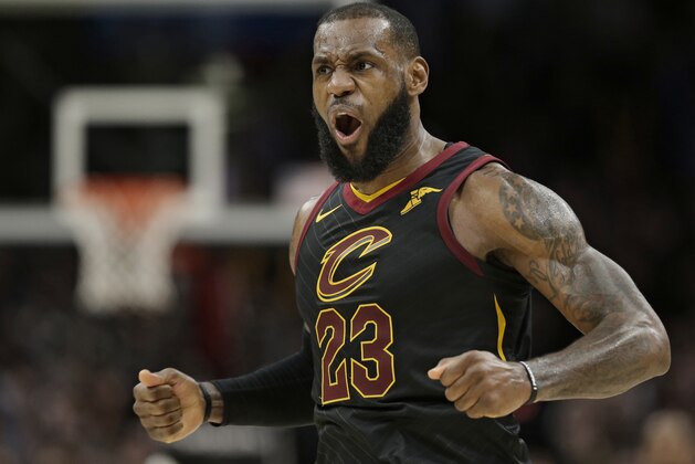 Cleveland Cavaliers' LeBron James celebrates after scoring in the second half of an NBA basketball game against the Sacramento Kings, Wednesday, Dec. 6, 2017, in Cleveland. The Cavaliers won 101-95. (AP Photo/Tony Dejak)