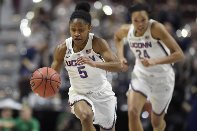 Connecticut's Crystal Dangerfield (5) runs up the court after a steal during the first half of an NCAA college basketball game against Tulane in the American Athletic Conference tournament quarterfinals at Mohegan Sun Arena, Sunday, March 4, 2018, in Uncasville, Conn. (AP Photo/Jessica Hill)