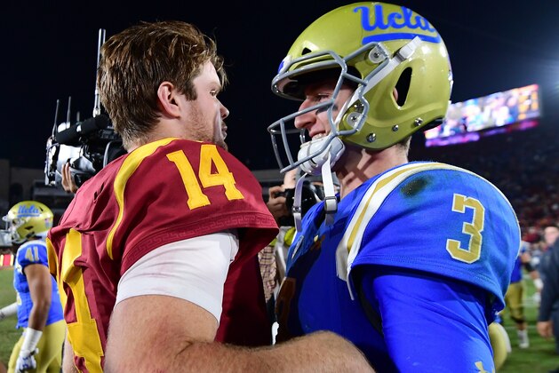 LOS ANGELES, CA - NOVEMBER 18:  Josh Rosen #3 of the UCLA Bruins and Sam Darnold #14 of the USC Trojans meet on the field after a 28-23 Trojan win at Los Angeles Memorial Coliseum on November 18, 2017 in Los Angeles, California.  (Photo by Harry How/Getty Images)