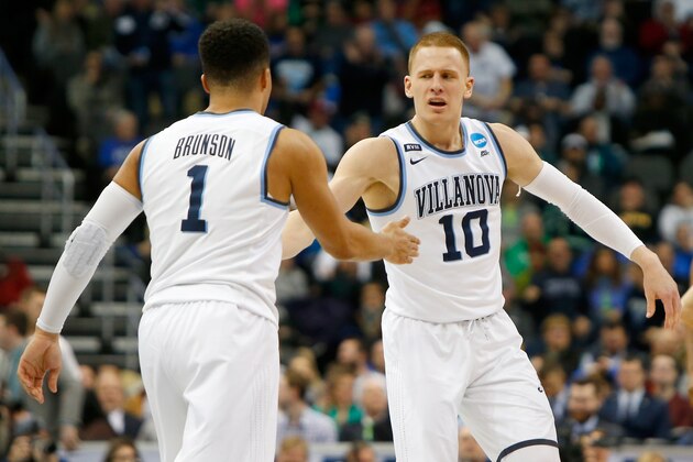 PITTSBURGH, PA - MARCH 17:  Donte DiVincenzo #10 of the Villanova Wildcats celebrates with his teammate Jalen Brunson #1 against the Alabama Crimson Tide during the second half in the second round of the 2018 NCAA Men's Basketball Tournament at PPG PAINTS Arena on March 17, 2018 in Pittsburgh, Pennsylvania.  (Photo by Justin K. Aller/Getty Images)
