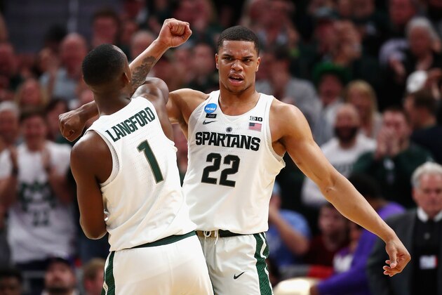 DETROIT, MI - MARCH 16:  Miles Bridges #22 of the Michigan State Spartans celebrates with Joshua Langford #1 during the second half against the Bucknell Bison in the first round of the 2018 NCAA Men's Basketball Tournament at Little Caesars Arena on March 16, 2018 in Detroit, Michigan.  (Photo by Gregory Shamus/Getty Images)