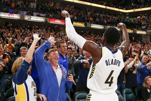 INDIANAPOLIS, IN - DECEMBER 10: Victor Oladipo #4 of the Indiana Pacers celebrates with fans after defeating the Denver Nuggets at Bankers Life Fieldhouse on December 10, 2017 in Indianapolis, Indiana. NOTE TO USER: User expressly acknowledges and agrees that, by downloading and or using this photograph, User is consenting to the terms and conditions of the Getty Images License Agreement. (Photo by Michael Hickey/Getty Images)