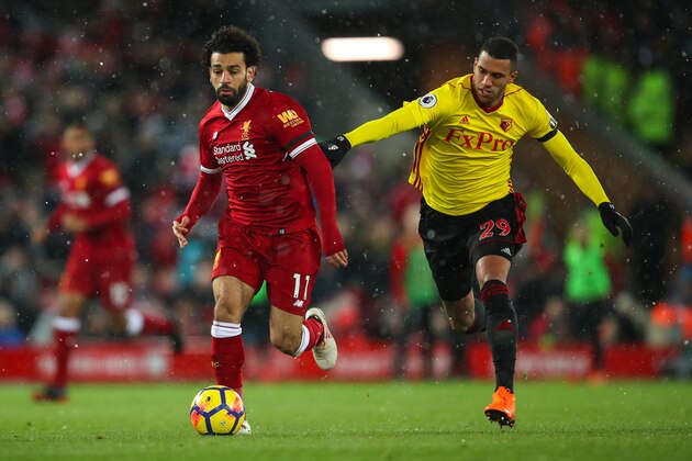 LIVERPOOL, ENGLAND - MARCH 17: Mohamed Salah of Liverpool and Etienne Capoue of Watford during the Premier League match between Liverpool and Watford at Anfield on March 17, 2018 in Liverpool, England. (Photo by Robbie Jay Barratt - AMA/Getty Images)