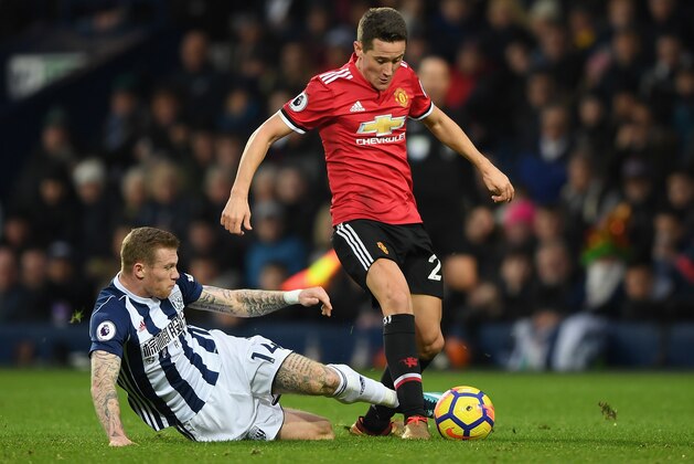 WEST BROMWICH, ENGLAND - DECEMBER 17:  James McClean of West Bromwich Albion tackles Ander Herrera of Manchester United during the Premier League match between West Bromwich Albion and Manchester United at The Hawthorns on December 17, 2017 in West Bromwich, England.  (Photo by Shaun Botterill/Getty Images)