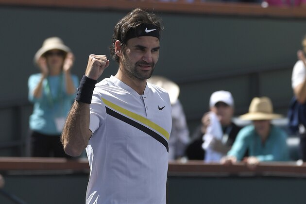 Roger Federer, of Switzerland, celebrates after beating Borna Coric, of Croatia, during the semifinals at the BNP Paribas Open tennis tournament, Saturday, March 17, 2018, in Indian Wells, Calif. (AP Photo/Mark J. Terrill)