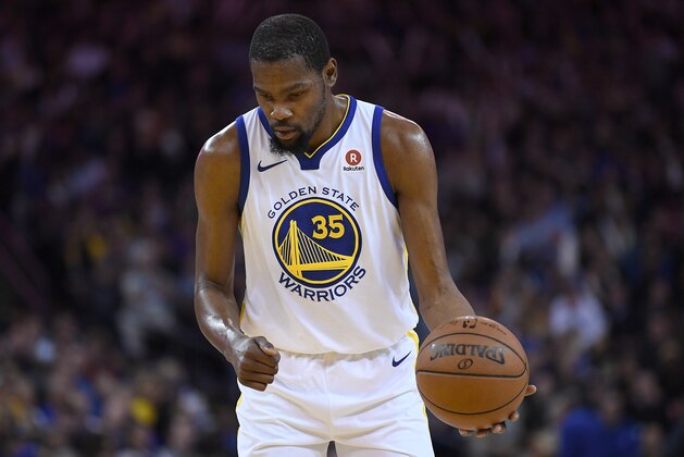 OAKLAND, CA - MARCH 14:  Kevin Durant #35 of the Golden State Warriors stands at the line to shoot a technical foul shot against the Los Angeles Lakers during an NBA basketball game at ORACLE Arena on March 14, 2018 in Oakland, California. NOTE TO USER: User expressly acknowledges and agrees that, by downloading and or using this photograph, User is consenting to the terms and conditions of the Getty Images License Agreement.  (Photo by Thearon W. Henderson/Getty Images)