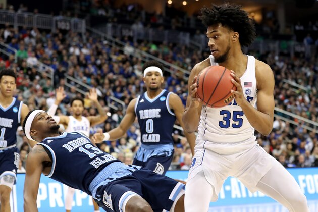 PITTSBURGH, PA - MARCH 17:  Marvin Bagley III #35 of the Duke Blue Devils drives to the basket against Stanford Robinson #13 of the Rhode Island Rams during the first half in the second round of the 2018 NCAA Men's Basketball Tournament at PPG PAINTS Arena on March 17, 2018 in Pittsburgh, Pennsylvania.  (Photo by Rob Carr/Getty Images)