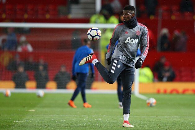 MANCHESTER, ENGLAND - MARCH 17:  Paul Pogba of Manchester warming up before the Emirates FA Cup Quarter Final between Manchester United and Brighton & Hove Albion at Old Trafford on March 17, 2018 in Manchester, England.  (Photo by Alex Livesey/Getty Images)