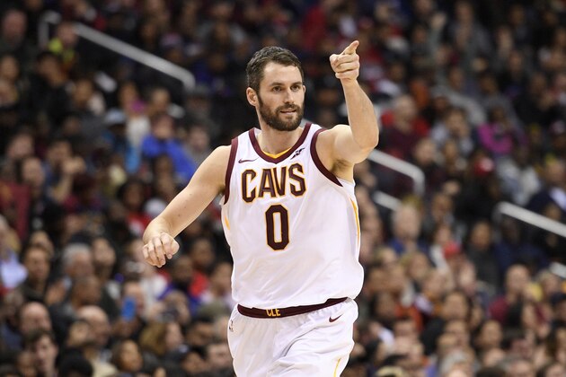 Cleveland Cavaliers forward Kevin Love (0) points after he scored during the second half of an NBA basketball game against the Washington Wizards, Sunday, Dec. 17, 2017, in Washington. The Cavaliers won 106-99. (AP Photo/Nick Wass)