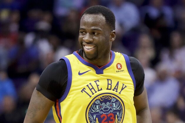 Golden State Warriors forward Draymond Green plays against the Phoenix Suns during an NBA basketball game in Phoenix, Sunday, March 18, 2018. (AP Photo/Chris Carlson)