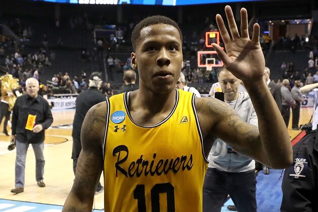 CHARLOTTE, NC - MARCH 16: Jairus Lyles #10 of the UMBC Retrievers walks off the floor after defeating the Virginia Cavaliers 74-54 during the first round of the 2018 NCAA Men's Basketball Tournament at Spectrum Center on March 16, 2018 in Charlotte, North Carolina. (Photo by Streeter Lecka/Getty Images) CHARLOTTE, NC - MARCH 16: Jairus Lyles #10 of the UMBC Retrievers walks off the floor after defeating the Virginia Cavaliers 74-54 during the first round of the 2018 NCAA Men's Basketball Tournament at Spectrum Center on March 16, 2018 in Charlotte, North Carolina. (Photo by Streeter Lecka/Getty Images)