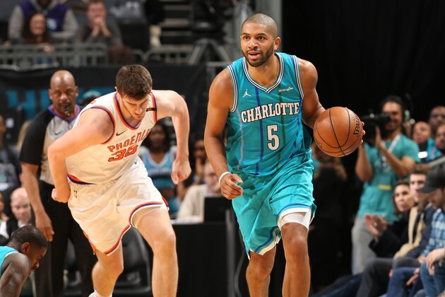 CHARLOTTE, NC - MARCH 10: Nicolas Batum #5 of the Charlotte Hornets handles the ball during the game against the Phoenix Suns on March 10, 2018 at Spectrum Center in Charlotte, North Carolina. NOTE TO USER: User expressly acknowledges and agrees that, by downloading and or using this photograph, User is consenting to the terms and conditions of the Getty Images License Agreement.  Mandatory Copyright Notice:  Copyright 2018 NBAE (Photo by Kent Smith/NBAE via Getty Images)