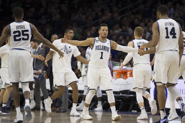 PHILADELPHIA, PA - DECEMBER 10: Mikal Bridges #25, Jalen Brunson #1, and Omari Spellman #14 of the Villanova Wildcats celebrate against the La Salle Explorers at the Wells Fargo Center on December 10, 2017 in Philadelphia, Pennsylvania. (Photo by Mitchell Leff/Getty Images)